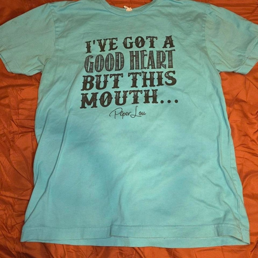 Live and‎ Tell blue graphic tee